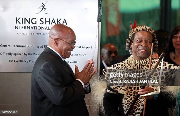 South African President Jacob Zuma applauds Zulu King Goodwill Zwelithini on May 8, 2010 after officially opening the Central Terminal building of...