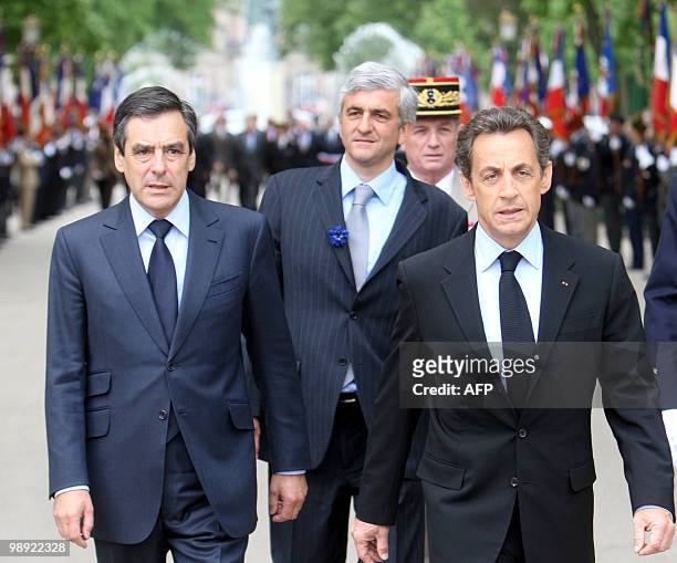 France's President Nicolas Sarkozy with France's Prime Minister Francois Fillon , and France's Defense Minister Herve Morin take part to a ceremony...