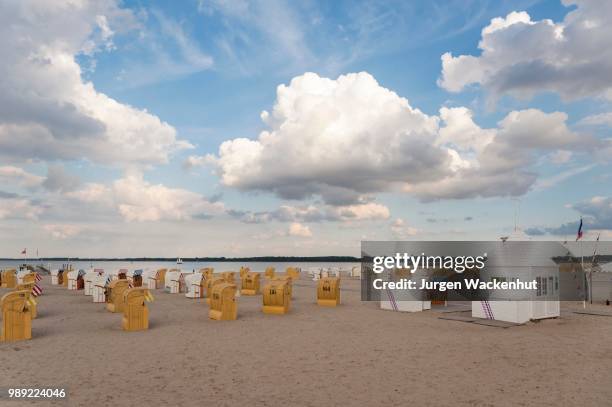 sandy beach beach with beach chairs, travemuende, baltic sea, schleswig-holstein, germany - travemuende stock pictures, royalty-free photos & images