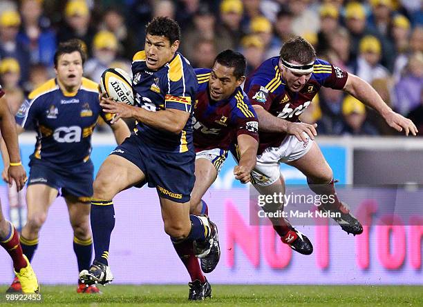 Tyrone Smith of the Brumbies makes a line break during the round 13 Super 14 match between the Brumbies and the Highlanders at Canberra Stadium on...