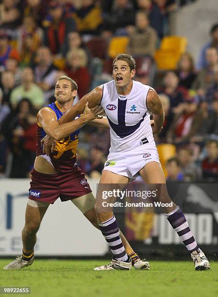 Aaron Sandilands of the Dockers jostles for position with Jared Brennan of the Lions during the round seven AFL match between the Brisbane Lions and...