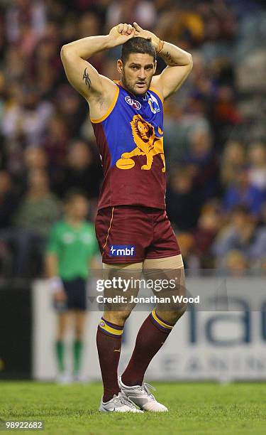 Brendan Fevola of the Lions rests during the round seven AFL match between the Brisbane Lions and the Fremantle Dockers at The Gabba on May 8, 2010...