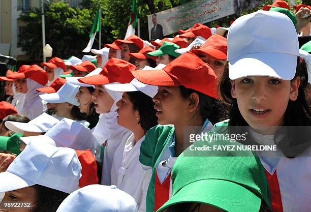 Algerian children sing during the 65th anniversary of the Setif massacre in Setif, eastern Algeria on May 8, 2010.The initial outbreak occurred on...