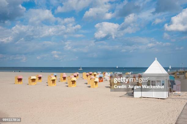 empty sandy beach with beach chairs, travemuende, baltic sea, schleswig-holstein, germany - travemuende stock pictures, royalty-free photos & images