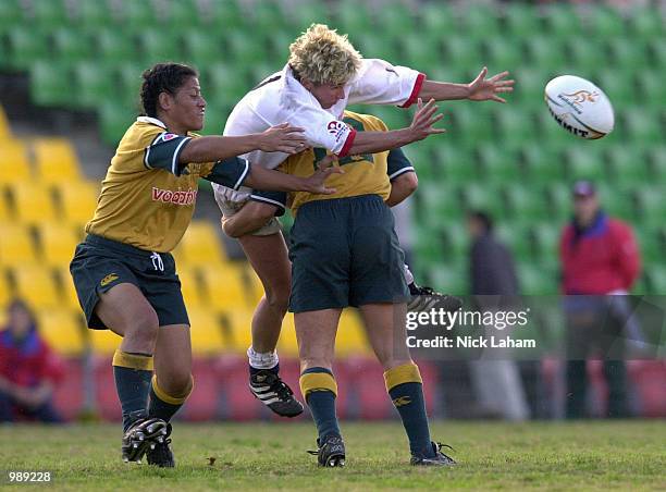 Shelley Rae of England is tackled by Tanya Osborne of Australia A during the womens rugby match between England and Australia A at Waratah Park,...