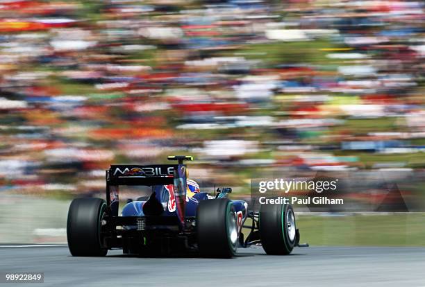 Mark Webber of Australia and Red Bull Racing drives on his way to finishing first during qualifying for the Spanish Formula One Grand Prix at the...