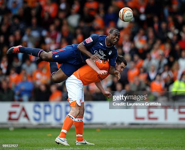 Ben Burgess of Blackpool battles with Wes Morgan of Nottingham Forest during the Coca-Cola Championship Playoff Semi Final 1st Leg match at...