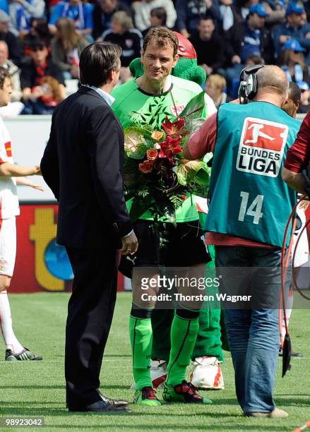 Goalkeeper Jens Lehmann of Stuttgart gets a honor for his last Bundesliga match prior to the Bundesliga match between TSG 1899 Hoffenheim and VFB...