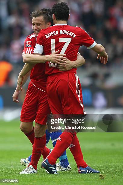 Ivica Olic of Bayern celebrates the first goal with Mark van Bommel during the Bundesliga match between Hertha BSC Berlin and FC Bayern Muenchen at...