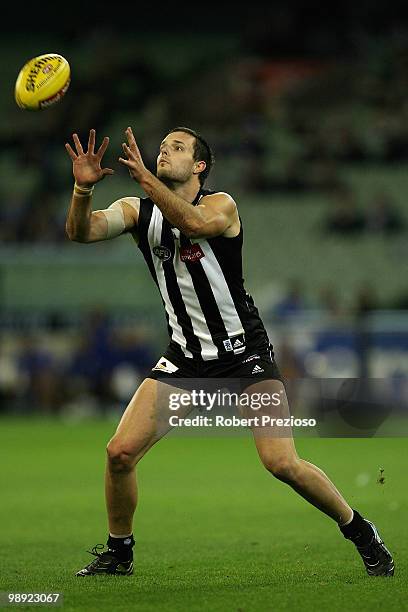 Nathan Brown of the Magpies marks during the round seven AFL match between the Collingwood Magpies and the North Melboune Kangaroos at Melbourne...