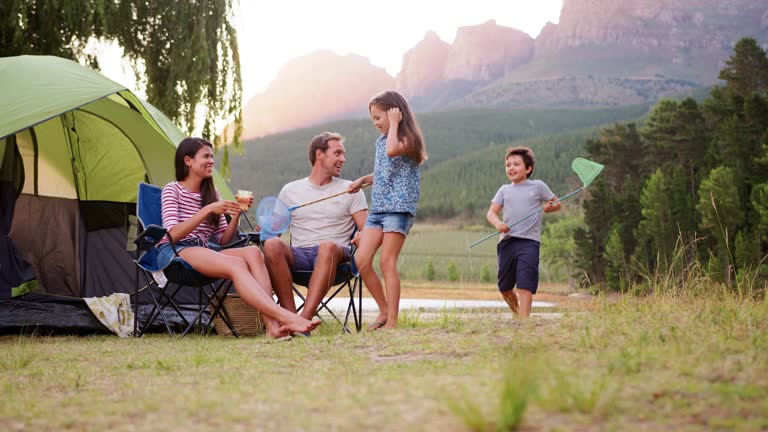 https://media.gettyimages.com/id/989232280/video/kids-run-to-join-parents-sitting-by-tent-in-rural-setting.jpg?b=1&s=640x640&k=20&c=bw_wA3LvWErbXFzM15WKgmAlJUr_ih8WzQIYiLxZCGE=