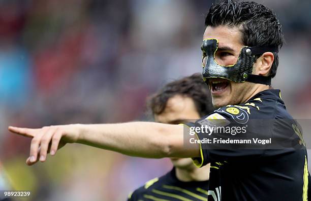 Nuri Sahin of Dortmund gestures during the Bundesliga match between SC Freiburg and Borussia Dortmund at Badenova stadium on May 8, 2010 in Freiburg...