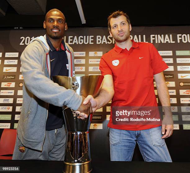 Pete Mickeal, #33 of Regal FC Barcelona and Theodoros Papaloukas, #4 of Olympiacos Piraeus shake hands during the Final Four Presentation Press...