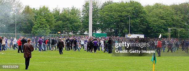 The Fans of Aue celebrate during the Third League match between Werder Bremen II and Erzgebirge Aue at the "Platz 11" stadium on May 8, 2010 in...