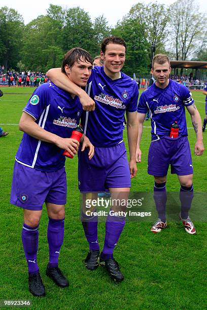 The Team of Aue celebrates after the Third League match between Werder Bremen II and Erzgebirge Aue at the "Platz 11" stadium on May 8, 2010 in...