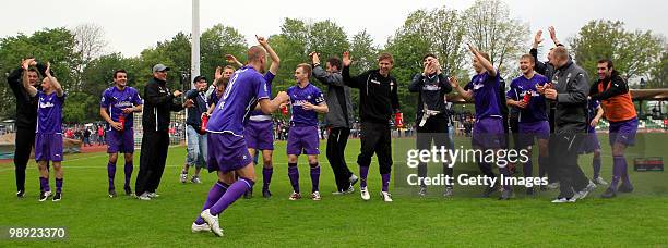 The Team of Aue celebrates after the Third League match between Werder Bremen II and Erzgebirge Aue at the "Platz 11" stadium on May 8, 2010 in...