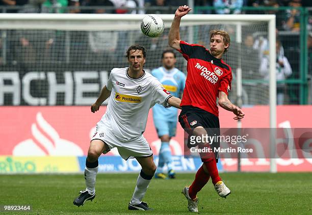 Roel Brouwers of Gladbach and Stefan Kiessling of Leverkusen battle for the ball during the Bundesliga match between Borussia Moenchengladbach and...