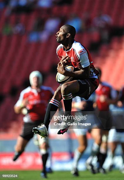Tonderai Chavhanga of the Lions gets under a high ball during the Super 14 match between Auto and General Lions and Blues at Coca Cola Park on May...