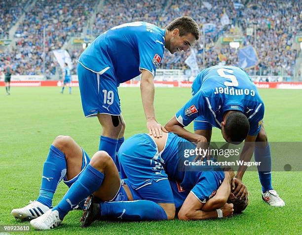 Player of Hoffenheim celebrate after Boris Vukcevic scores his team first goal during the Bundesliga match between TSG 1899 Hoffenheim and VFB...