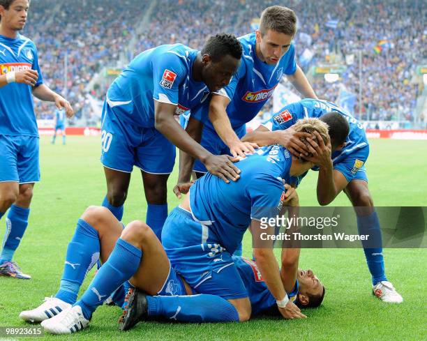 Player of Hoffenheim celebrate after Boris Vukcevic scores his team's first goal during the Bundesliga match between TSG 1899 Hoffenheim and VFB...