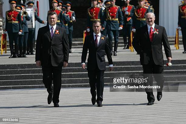 Russian President Dmitry Medvedev, Ukrainian President Viktor Yanukovych and Belarussian President Alexander Lukahsenko attend a ceremony at the Tomb...