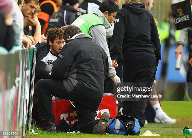 Danny Cipriani of Wasps looks receives treatment to his hand during the Guinness Premiership match between Newcastle Falcons and London Wasps at...