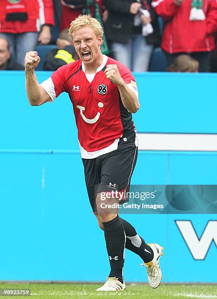 Mike Hanke of Hannover celebrates after scoring his team's second goal during the Bundesliga match between VfL Bochum and Hannover 96 at Rewirpower...