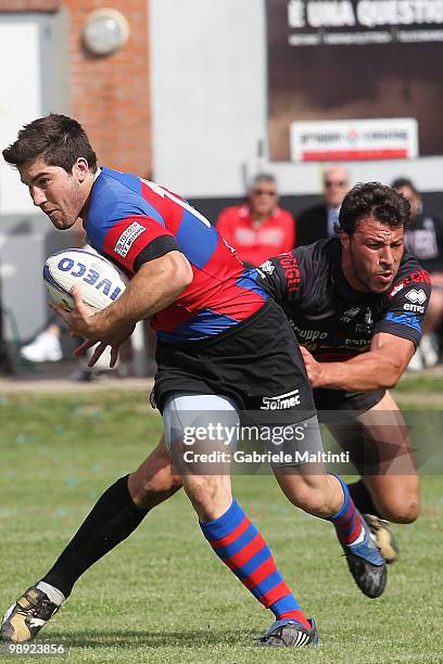 Galante Alessio is tackled by Pratichetti Andrea during the Campionato Eccellenza Super 10 match between I Cavalieri Prato and Fermi-CZ Rovigo at...