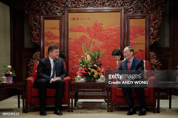 President of the United Nations General Assembly, Miroslav Lajcak , speaks with China's Vice President Wang Qishan during their meeting at the...