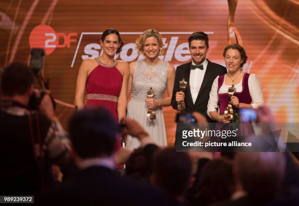 Beach volleyball players Kira Walkenhorst and Laura Ludwig, named Team of the Year, athletes of the year Johannes Rydzek and Laura Dahlmeier during...