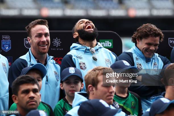 Josh Addo-Carr laughs alongside James Maloney and James Roberts during the New South Wales Blues State of Origin Team Announcement at ANZ Stadium on...