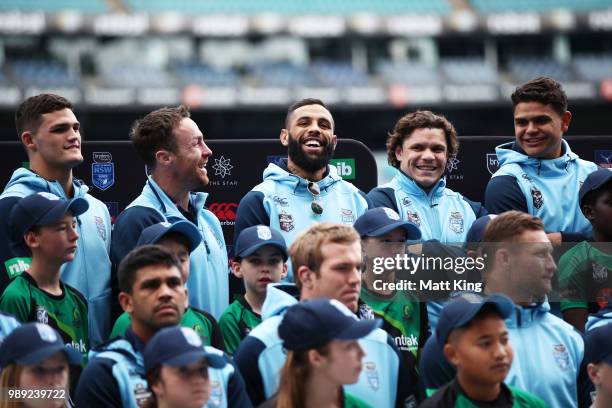 Josh Addo-Carr laughs alongside James Maloney and James Roberts during the New South Wales Blues State of Origin Team Announcement at ANZ Stadium on...