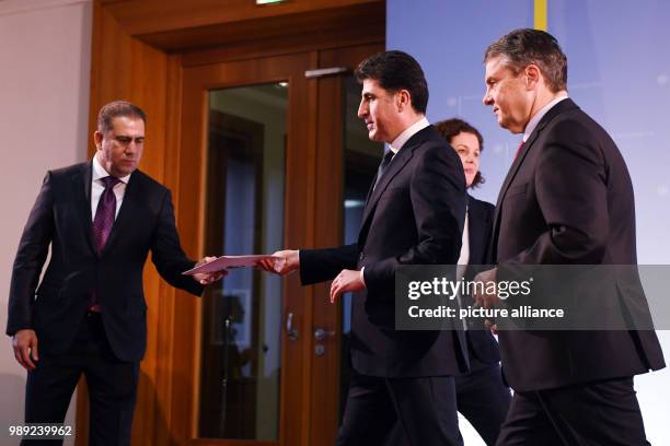 German foreign minister Sigmar Gabriel and the premiere of the Kurdistan-Iraq region, Nechirvan Barsani, partake in a press conference during a press...