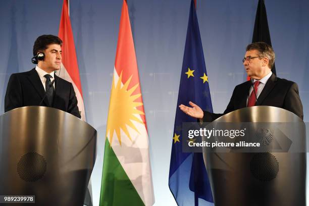 German foreign minister Sigmar Gabriel and the premiere of the Kurdistan-Iraq region, Nechirvan Barsani, partake in a press conference during a press...