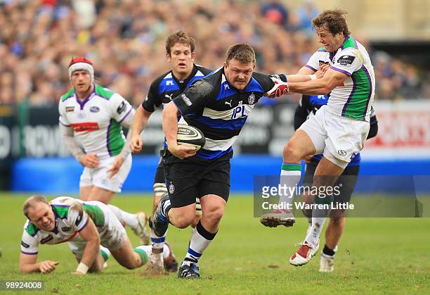 David Wilson of Bath hands off Andy Gomarsall of Leeds Carnegie during the Guinness Premiership match between Bath and Leeds Carnegie on May 8, 2010...