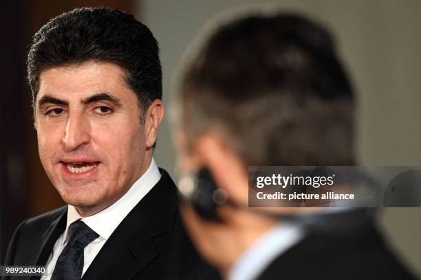 German Foreign Minister Sigmar Gabriel and the Prime Minister of the Kurdistan Regional Government of Iraqi Kurdistan, Nechirvan Barzani, give a...
