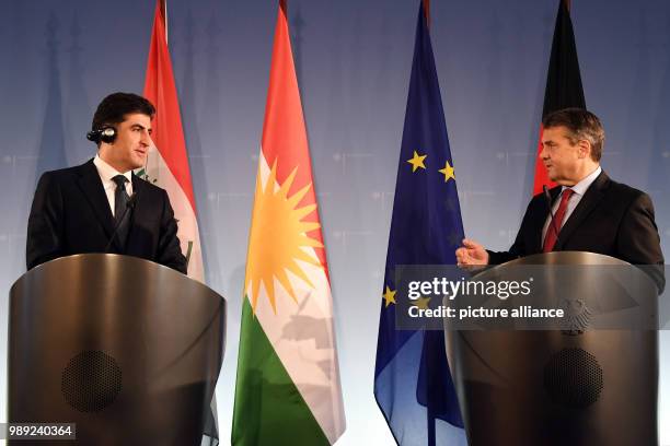German Foreign Minister Sigmar Gabriel and the Prime Minister of the Kurdistan Regional Government of Iraqi Kurdistan, Nechirvan Barzani, give a...