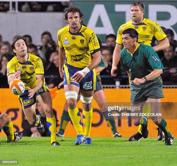 Clermont's French scrum-half Morgan Parra clears the ball out of a scrum during the French Top 14 rugby union match Clermont vs. Racing Metro at the...