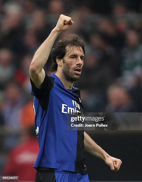 Ruud van Nistelrooy of Hamburg celebrates after scoring his team's first goal during the Bundesliga match between SV Werder Bremen and Hamburger SV...