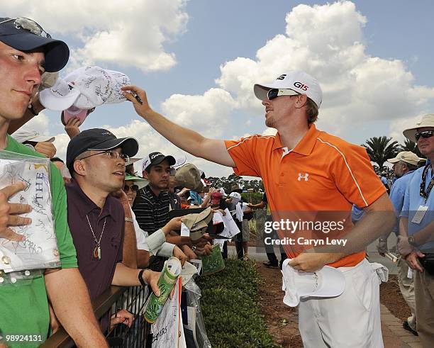 Hunter Mahan signs autographs after the second round of THE PLAYERS Championship on THE PLAYERS Stadium Course at TPC Sawgrass on May 7, 2010 in...