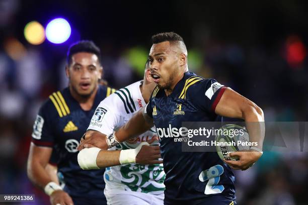 During the round 17: Tevita Li of the Highlanders makes a break during the Super Rugby match between the Highlanders and the Chiefs at ANZ National...