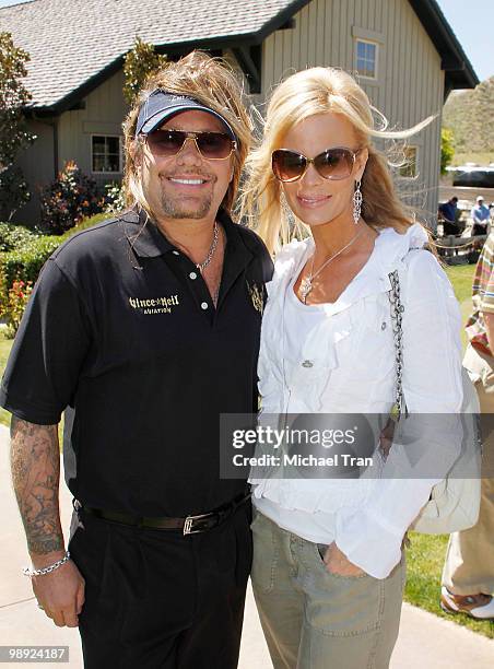 Vince Neil and Lia Neil attend the 14th Annual Skylar Neil golf tournament held at Lost Canyons Golf Club on May 7, 2010 in Simi Valley, California.