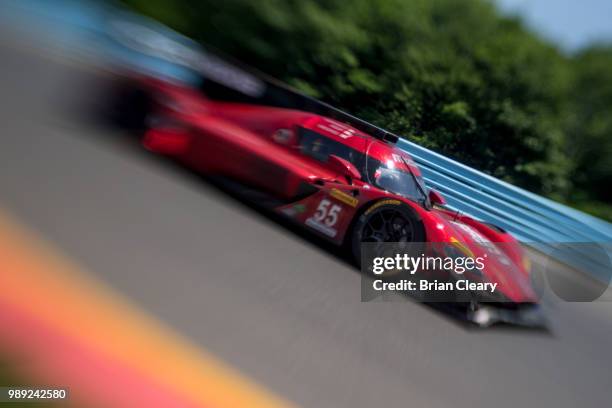 The Mazda DPi of Jonathan Bomarito, Harry Tincknell, of Great Britain, and Spencer Pigot races on the track during the Sahlens Six Hours of the Glen...