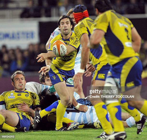 Clermont's French scrum-half Morgan Parra clears the ball out of a grab during the French Top 14 rugby union match Clermont vs. Racing Metro at the...