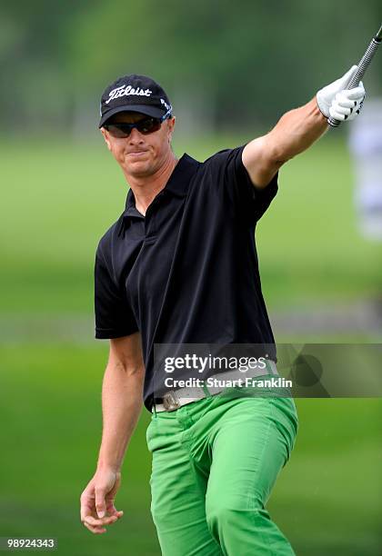 Fredrik Andersson Hed of Sweden celebrates holing his bunker shot on the 17th hole during the third round of the BMW Italian Open at Royal Park I...