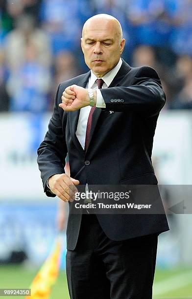 Head coach Christian Gross of Stuttgart gestures during the Bundesliga match between TSG 1899 Hoffenheim and VFB Stuttgart at Rhein-Neckar Arena on...
