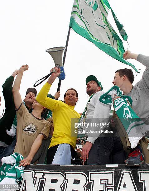 Goalkeeper Tim Wiese of Bremen celebrates with the fans after the Bundesliga match between SV Werder Bremen and Hamburger SV at Weser Stadium on May...