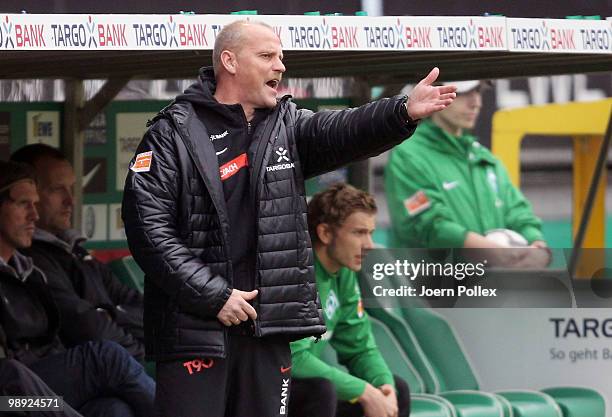 Head coach Thomas Schaaf of Bremen gestures during the Bundesliga match between SV Werder Bremen and Hamburger SV at Weser Stadium on May 8, 2010 in...