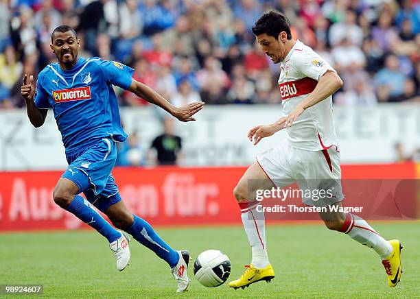 Marvin Compper of Hoffenheim battles for the ball with Ciprian Marica of Stuttgart during the Bundesliga match between TSG 1899 Hoffenheim and VFB...