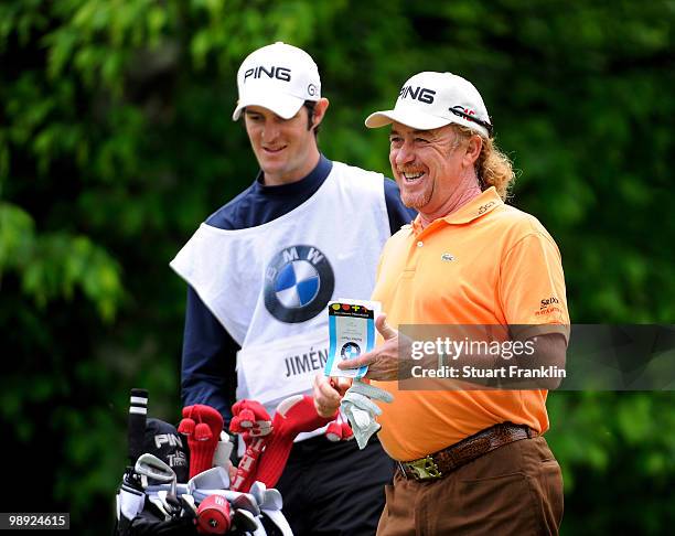 Miguel Angel Jimenez of Spain and caddie look happy on the 11th hole during the third round of the BMW Italian Open at Royal Park I Roveri on May 8,...